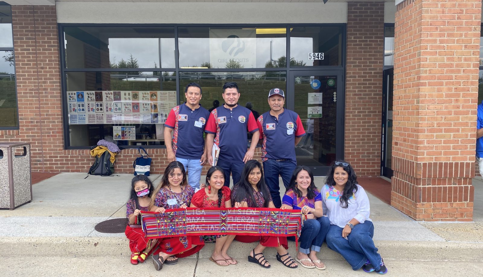 Image of people sitting and posing for picture